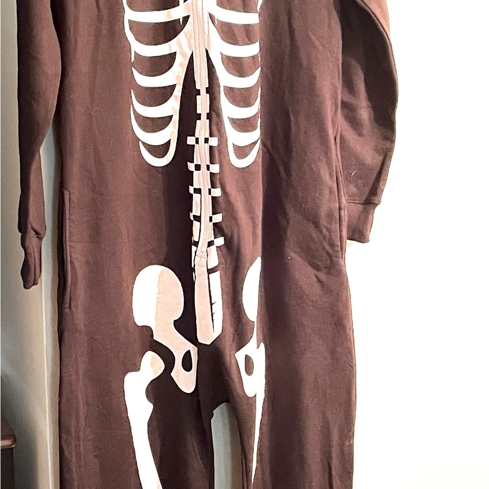 Skeleton print black onsie.